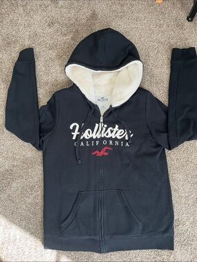 Hollister Black Zip Hoodie with Cream Sherpa Hood and Red Logo